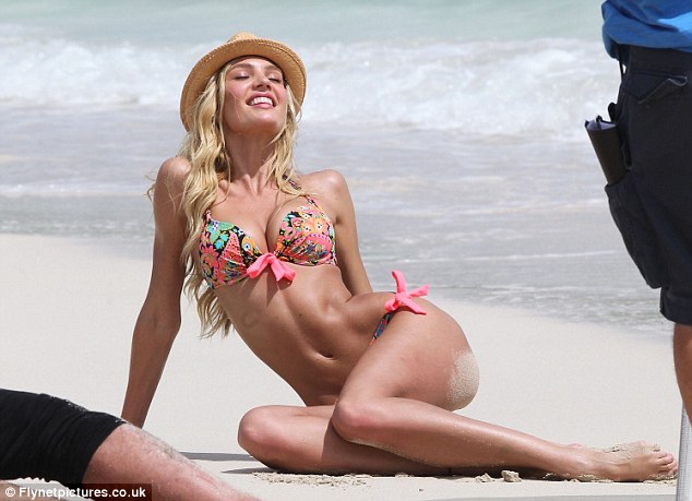 Taking it all in: Candice relax in the sun during takes 
